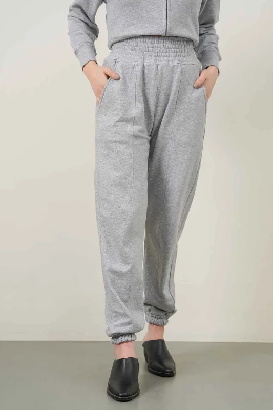 TROUSERS WITH ELASTICATED HEM